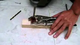 Building a Toner Hole Making Tool (DivX)