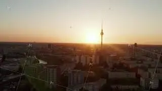 AERIAL: Flight over Berlin, Germany at beautiful Sunset, Sunlight and view on Alexanderplatz TV