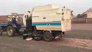 Tractor trailed road vacuum sweeper machine