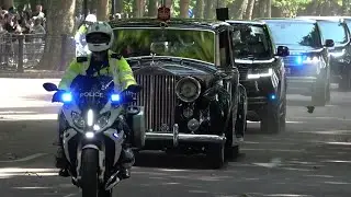 Huge convoy of Royal vehicles being escorted by the Metropolitan Police, Special Escort Group. 
