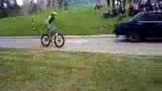 bike jumping over seven people of the ground