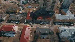 Flying over Russian township in spring