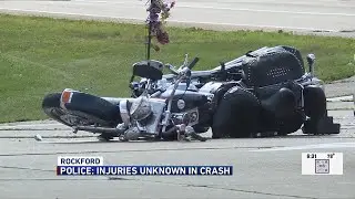 Car hits pole in crash involving motorcycle, reports say
