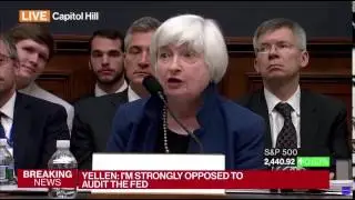 Buy Bitcoin sign behind Yellen