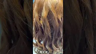 Iron curls students practice dummy hair