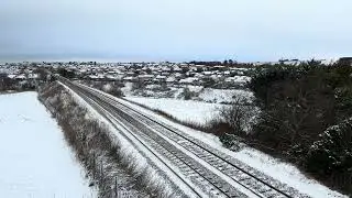 Colas Rail Class 70 passing Newtonhill on a snowy day