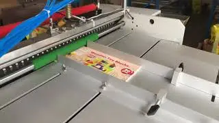 Paper canister labeling machine