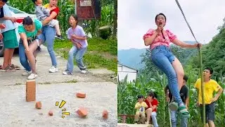 Women who know Chinese kung fu! Shattering bricks in a far distance!