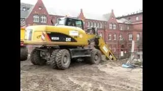 Bagger Caterpillar M322D / Excavator
