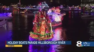 Holiday Lighted Boat Parade cruises through downtown Tampa