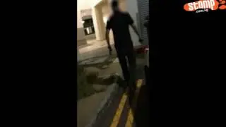 Driver who parks car at double yellow line area gets into heated dispute with man who tries to snap