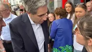 Irish Taoiseach Simon Harris runs away from Enoch Burke questions