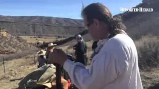 Learning how to load a muzzleloader at the Buckhorn Skinners muzzleloaders meeting Sunday. Story com