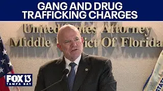 U.S. Attorney announcing charges against local gang and drug trafficking organization