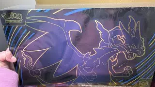 unboxing pokemon Mega Charizard ex pokemon cards. Costco released 2 boxes for 184 bucks online.