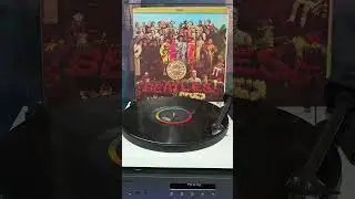 Sonando Vinylos The Beatles 