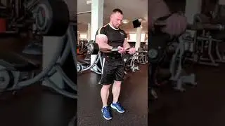 Massive muscle bull Volodymr Byruk pumping iron