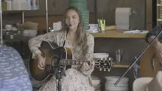 Paige King Johnson plays her song 