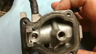 Rebuilding a carburator on a 9.9 Johnson