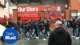Horrific scenes outside Anfield as Liverpool and Roma fans clash - Daily Mail