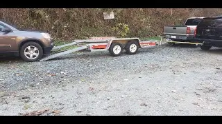 Погрузка неисправного автомобиля на Uhaul Car Hauler Plus NC Fall Colors