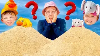 Cinq enfants construisent un ch&acirc;teau de sable g&eacute;ant sur la plage