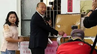 Taiwan's president wins second term after landslide election win