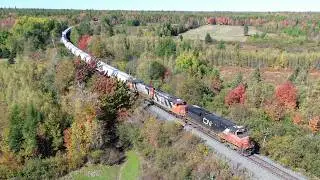 Awesome Aerial 4K View! Decent Size Local Train CN 569 East approaching Berry Mills, NB