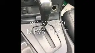 Take apart center console, replace SRS main module Volvo S60