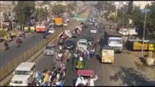 Protesting Indian farmers block roads with tractors