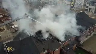 Bolton: Firefighters battling house fire from exposures aerial view 12-7-2022