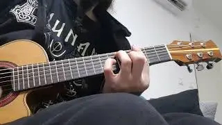 Tiny acoustic guitar after love & care