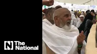 Hajjis take part in stoning the Devil
