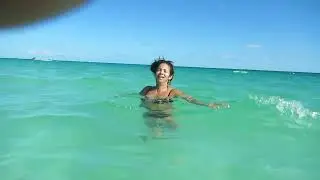 In Tulum's blue beach water