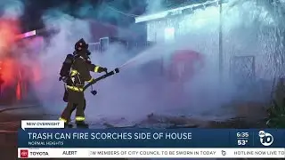 Trash can fire scorches side of Normal Heights home