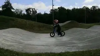 Kidvelo Rookie 12 Balance Bike ridden by Grayson, at Birmingham BMX track with coach Kazzi.