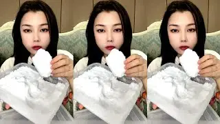WHITE ICE EATING / ONLY BITES. ICE EATING