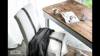How to stencil grain sack stripes on an Ikea slipcovered chair to get this charming farmhouse look!