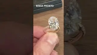 Oval diamond ring yellow gold hidden halo
