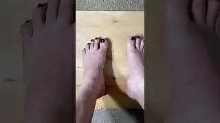 My black and blue painted toe nails and finger nails.