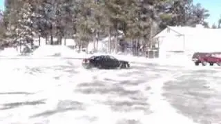 audi doing slides in snowy parking lot