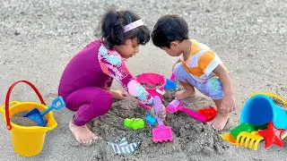 Nafeesa and Ahmed Have Fun on the Beach with Daddy