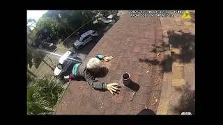 86-year-old Tampa man rescued after he became stranded and dangling from the roof