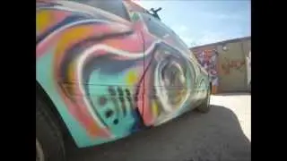 Joe Marchitti sprays car at Community Service Denver Colorado ALMOST SUMMERTIME