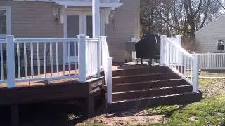 New Timbertech Deck with dual pergolas and flared stairs built by Deck Remodelers.com Glen Rock NJ