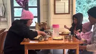Mom n son enjoying morning meal in Manipuri hotel  
