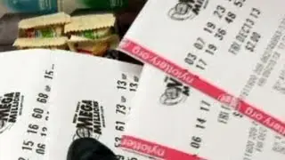 Mega Millions: Ga. woman claims half of huge lottery jackpot