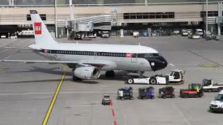 BA retrojet A319 G-EUPJ push back at Zurich
