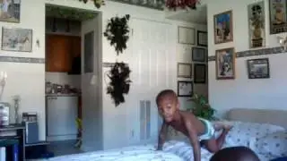 De'Qualin (4) doing a backwards flip