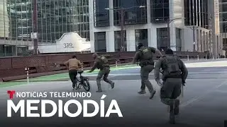 Captan a repartidor en bicicleta que escapó de agentes de ICE en Chicago | Noticias Telemundo